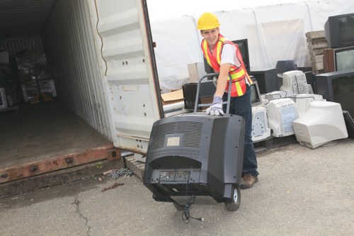 Man and van team loading rubbish in London